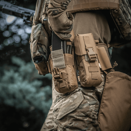 M-Tac Double Magazine Pouch with Fastex closure in use for AR and AK magazine storage during outdoor activities.
