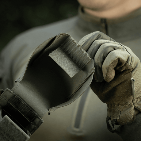 Use of M-Tac Double Magazine Pouch with Fastex Closure in nature, showing durability of Cordura 500D material