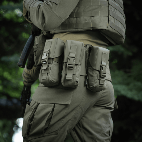 M-Tac Double Magazine Pouch with Fastex Closure on military uniform in forest environment