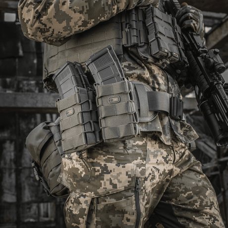 M-Tac open double magazine pouch for AK attached to camouflage uniform, designed for secure storage of AK magazines in extreme conditions.