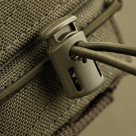 Close-up of M-Tac open double mag pouch for AK with vinyl-coated sealing material, close to a robust cord lock