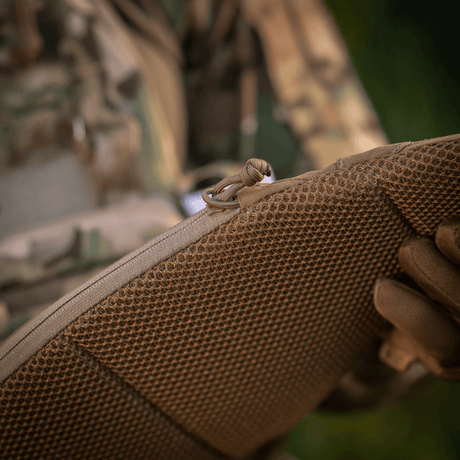 Close-up of M-Tac War Belt ARMOR with MOLLE webbing, showing durable Cordura 500D material in tactical use.