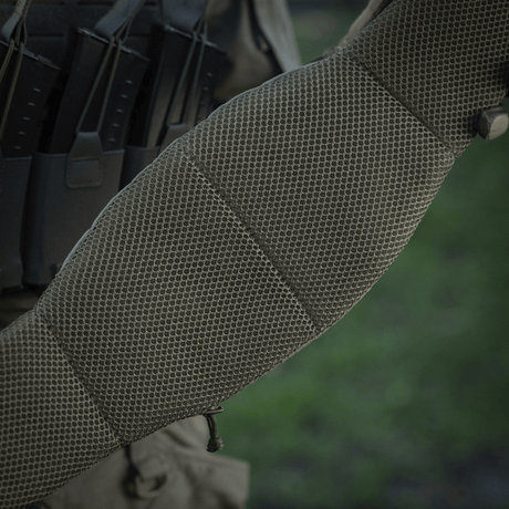 Close-up of M-Tac War Belt ARMOR with MOLLE-webbing, designed for tactical use and durable Cordura 500D construction.