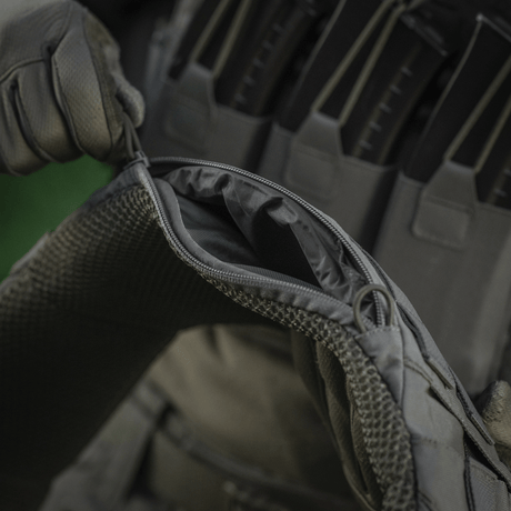 Close-up of M-Tac War Belt ARMOR in Cordura 500D with MOLLE-webbing, part of tactical gear for combat tasks.