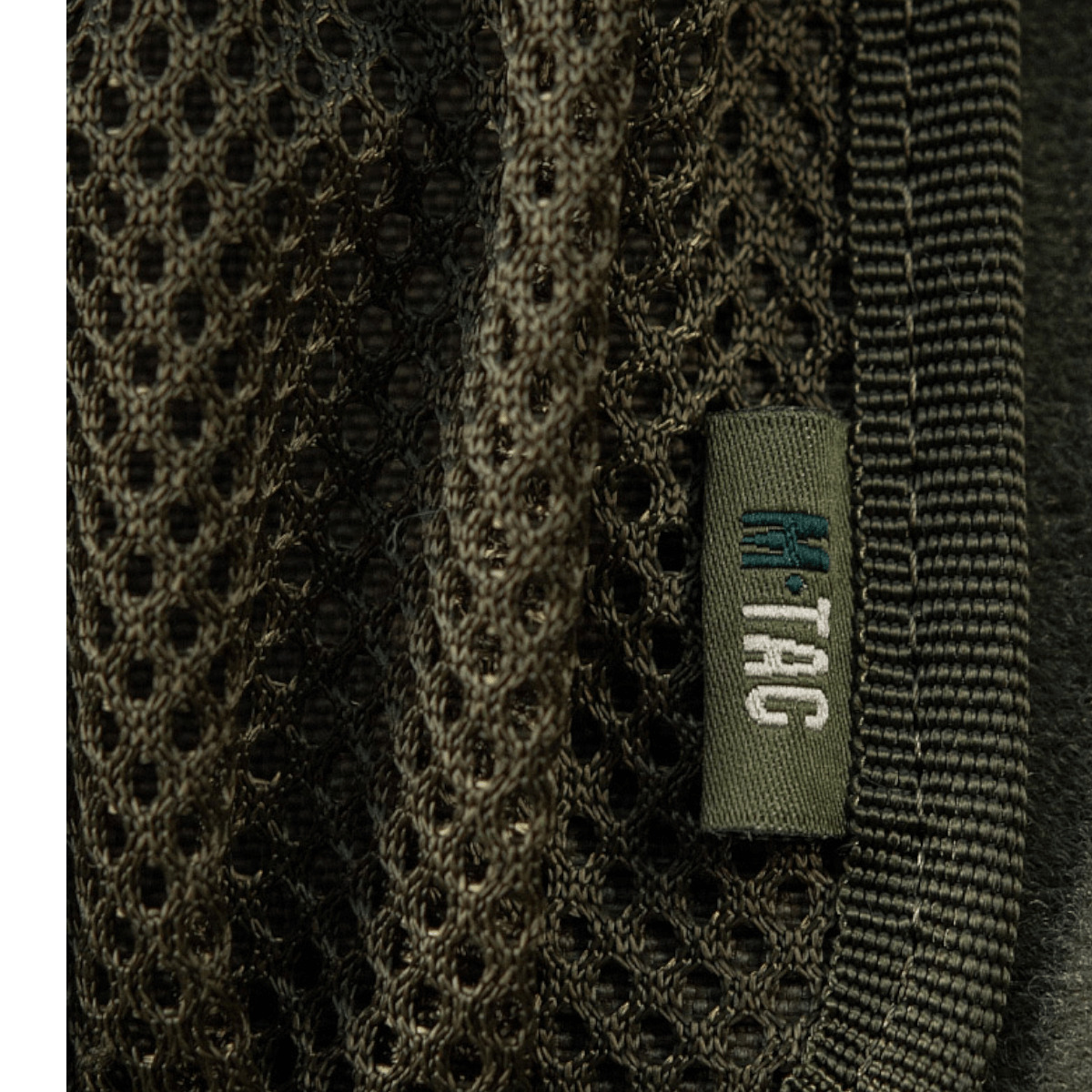 M-Tac Hook & Loop Low Profile Admin Panel med elastiske fastgøringer til organisering i taske eller rygsæk, set tæt på.