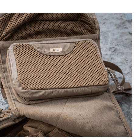 M-Tac Hook & Loop Utility Panel in a modular design with a robust mesh zip pocket for internal organization, gallery position 1.