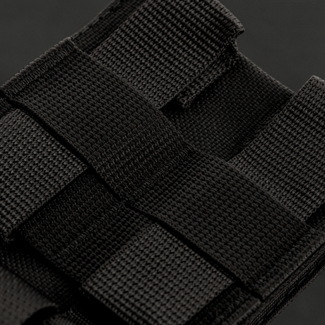 Close-up of M-Tac Mag Drop Pouch Elite with MOLLE attachments for secure magazine storage and quick emptying