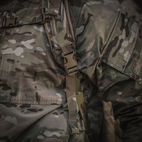 Tactical clothing with camouflage pattern and straps in focus.