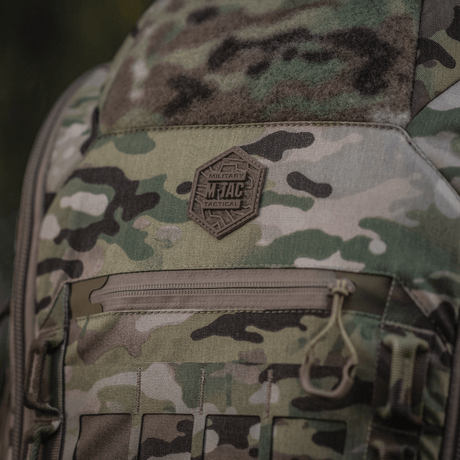 M-Tac Large Gen.IV Elite in durable Cordura with camo design and a pocket for weapon storage.