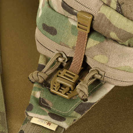 Close-up of M-Tac Bat Wing Bag Elite with camouflage and robust buckles, made of Cordura 500 MS.