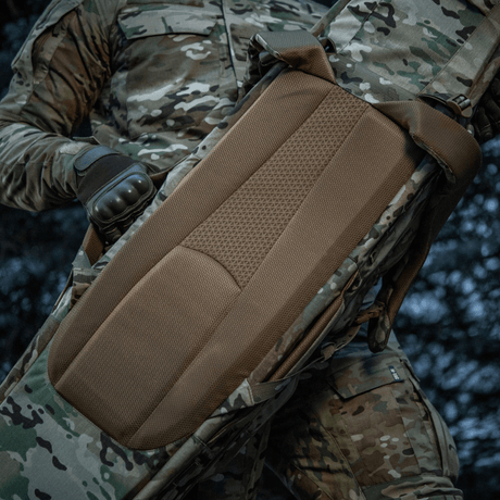 M-Tac Gun Backpack Case 125 cm Gen.II Elite in use with camo gear, showing ergonomic padded back panel, optimal for weapon transport