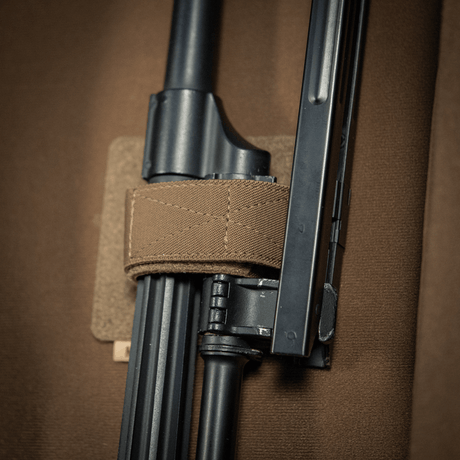 Close-up of internal fastening in M-Tac Gun Backpack Case 125 cm Gen.II Elite, showing solid padding and straps for secure storage