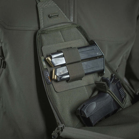 M-Tac Double Mag Pouch Hook Backed Magazine holding two magazines with Velcro fastening in a bag pocket, perfect for carry comfort