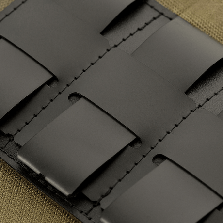 Close-up of M-Tac Tactical Morale Patch Display Board Hook and Loop Molle 120x85 with plastic base and MOLLE attachment for patches.