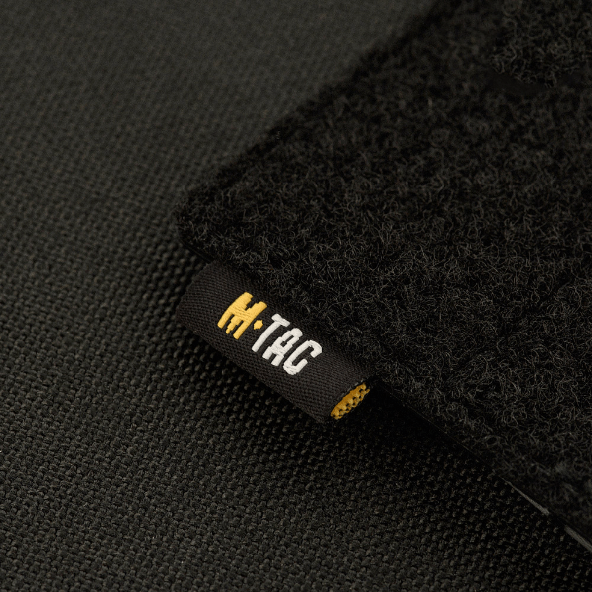 M-Tac Taktisk Morale Patch Display Board Hook og Loop Molle 120x85 med MOLLE-system fastgørelse og plastbase til patcher.