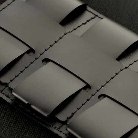 Close-up of M-Tac Tactical Morale Patch Display Board Hook and Loop Molle 120x85 plastic base with Hook and Loop surface.