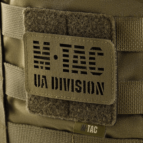 M-Tac MOLLE Patch Panel 80x85 attached to a backpack with hook & loop surface and plastic base for stability