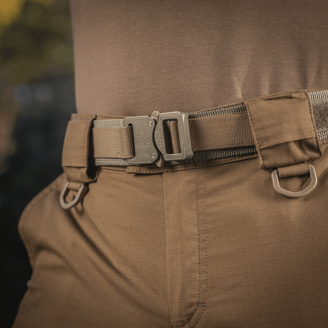M-Tac Cobra Buckle Tactical Belt Laser Cut in use, suited for military and police gear, made of Cordura Squadron and nylon webbing.