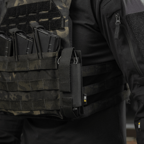 M-Tac Tourniquet Pouch Elastic VELCRO Gen.II mounted on a tactical vest, ready for quick access to C-A-T tourniquet. Robust Cordura 500D