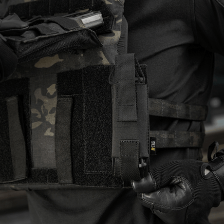 Tactical M-Tac Tourniquet Pouch Elastic VELCRO Gen.II mounted on a tactical vest for quick access to C-A-T tourniquet