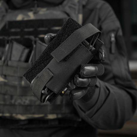 M-Tac Tourniquet Pouch Elastic VELCRO Gen.II in black design, attached to a tactical vest. Cordura 500D construction for durability