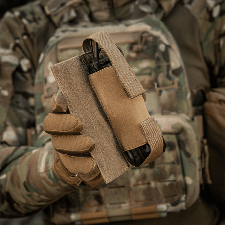 M-Tac Tourniquet Pouch Elastic VELCRO Gen.II attached to a tactical vest with quick access to tourniquet