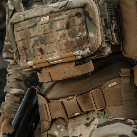 M-Tac Tourniquet Pouch Elastic VELCRO Gen.II mounted on tactical gear in camouflage, quick access to tourniquet