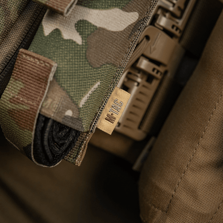 Close-up of M-Tac Tourniquet Pouch Elastic VELCRO Gen.II in camo pattern, made of Cordura 500D, secured with Texcel straps