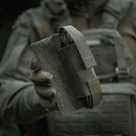 M-Tac Tourniquet Pouch Elastic VELCRO Gen.II on a plate carrier with fixed VELCRO closure. Tactical design made of Cordura 500D and Texcel straps