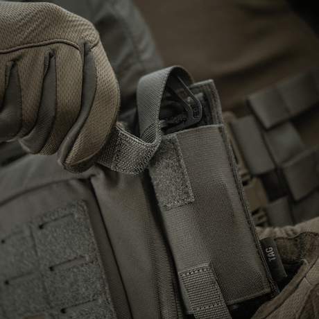 M-Tac Tourniquet Pouch Elastic VELCRO Gen.II mounted on a tactical vest with quick access to tourniquet. Robust Cordura 500D material