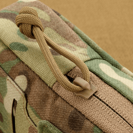 M-Tac PC Utility Pouch Elite with MOLLE interface in 500D Cordura, detail of zipper and drain. Perfect for storing small items. Size: 13 x 6 x 3 cm