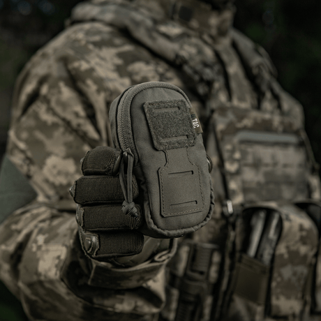 M-Tac PC Utility Pouch Elite with MOLLE system in tactical gear, Cordura material, suitable for small items. Perfect for field use, bottom drain included