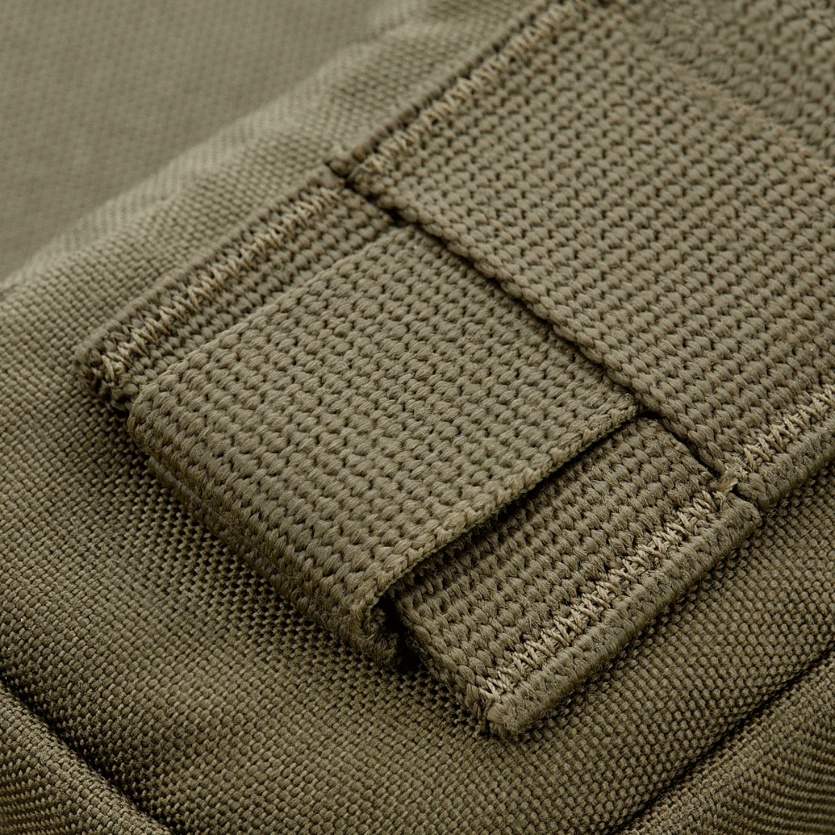 M-Tac PC Utility Pouch Elite med MOLLE-interface og 500D Cordura stof for taktisk opbevaring. Solid konstruktion, ideel til småting.
