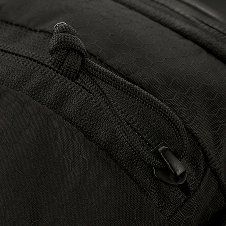 Close-up of zip compartments on M-Tac Sphaera Hex Hardsling Bag with hexagonal pattern in black Cordura/Hex polyester.