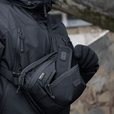 Person wearing M-Tac Sphaera Hex Hardsling Bag showing Cordura/Hex polyester material and practical compartments, compact modular design.
