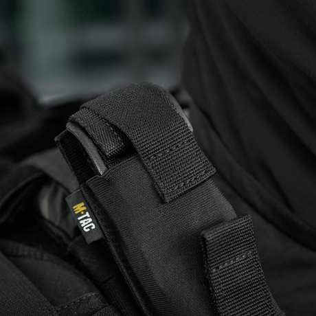 M-Tac Tourniquet Pouch Elastisk med MOLLE Gen.II fastgjort på udstyr; hurtig opbevaring af C-A-T tourniquet; Cordura materiale.