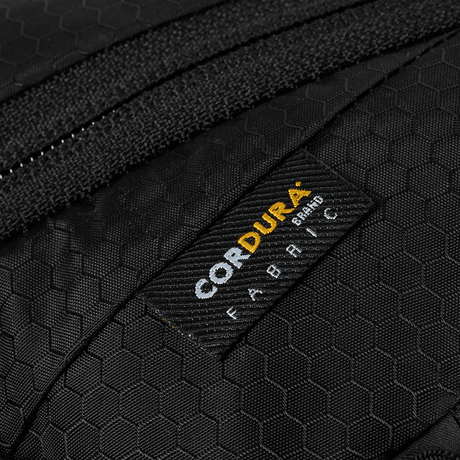 Close-up of M-Tac Sphaera Hex Hardsling Bag Gen.II Elite with Cordura fabric and hex pattern, focused on robust material.