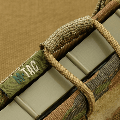 M-Tac Pistol Mag Pouch Gen.3 with adjustable plastic side plates and elastic, made of Cordura 500D, compatible with MOLLE system.