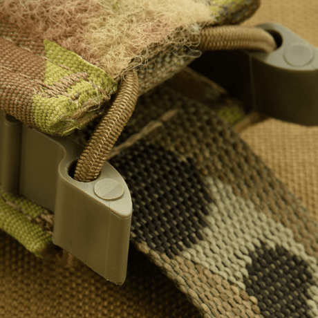 Close-up of M-Tac Pistol Mag Pouch Gen.3 made of Cordura 500D with MOLLE mounting system and plastic side plates. Tactical gear.