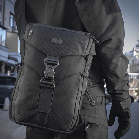 M-Tac Magnet XL Bag Elite Hex with FidLock closed in an urban setting.