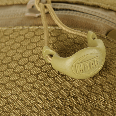 Close-up of M-Tac Cross Bag Elite Hex with Cordura 500 material and YKK zipper detail.