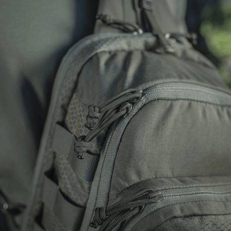Close-up of M-Tac Cross Bag Elite Hex with Cordura 500 material and YKK zippers, perfect for daily use and tactical purposes.