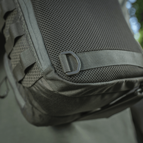 Detailed close-up of M-Tac Cross Bag Elite Hex with robust strap and mesh material, optimal for everyday use and tactical gear.