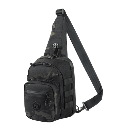 Black M‑Tac Cross Bag Elite Hex sling pack in Cordura 500 with MIL-SPEC fittings and YKK zippers, suitable for daily use and tactical gear