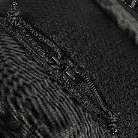 Detail image of M-Tac Cross Bag Elite Hex with robust Cordura 500 material and strong zippers for daily use or tactical gear.
