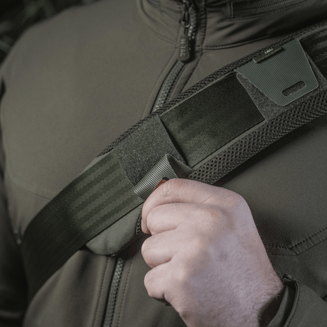 M‑Tac Shoulder Strap Pad 50 mm Elite on user's shoulder, showing comfort and support with Cordura and 3D mesh.