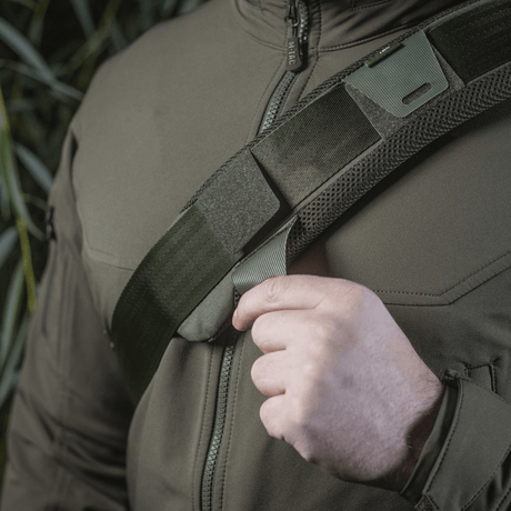 M‑Tac Shoulder Strap Pad 50 mm Elite mounted on shoulder, showing comfortable fit and rugged Cordura material with 3D mesh.