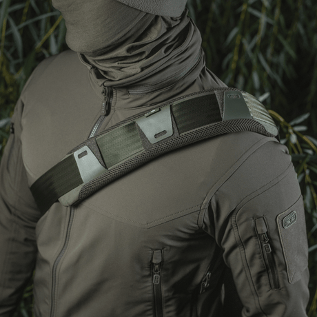 M‑Tac Shoulder Strap Pad 50 mm Elite mounted on shoulder, with 3D mesh for comfort and Cordura for durability, worn with tactical jacket.