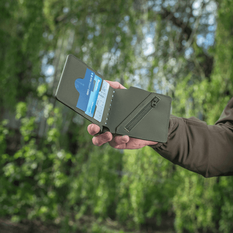 M-Tac Slim Elite Gen. II in hand, showing pockets for cards.