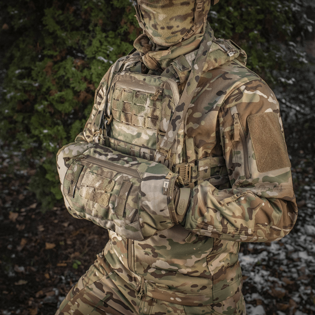 M-Tac Taktisk Håndvarmer Elite i camouflagelook og robust Cordura 500D, perfekt til kolde vejrforhold og udendørs aktiviteter.